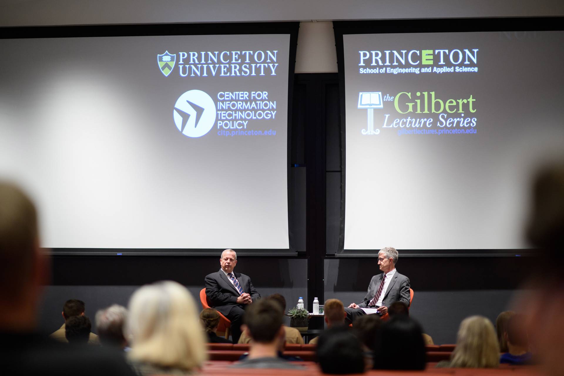 General John Allen sitting with Edward Felten before an audience.