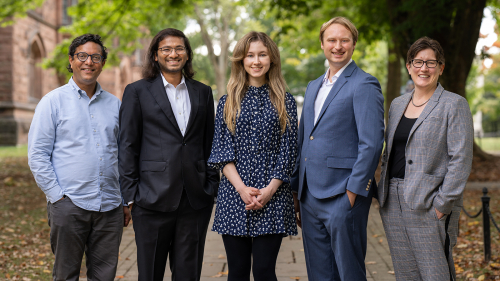 Researchers posed smiling